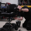 Andrew Warehouse repaing a mobiility scooter